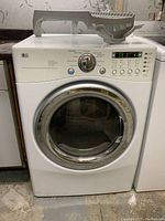 Front view of dryer with rack placed on top