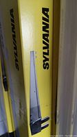 Yellow and black boxes labeled SYLVANIA with image of utility strip showing plug connectors.