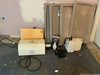 Overall shot of Hydrafarm light housing, Agrosun bulb box, power supply, and four plant trays