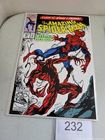 Front cover of The Amazing Spider-Man #361 showing Spider-Man and Carnage fighting, comic in protective sleeve.