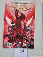 Front cover of Amazing Spider-Man #799 comic showing variant cover art by Alex Ross featuring Spider-Man characters in dynamic poses against a red background.
