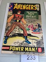 Front cover of The Avengers #21 featuring Power Man and the comic title