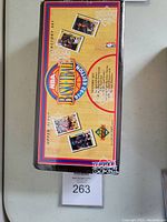 Front and top view of the unopened factory set box showing basketball card images and NBA 91/92 branding