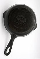 Top view of Griswold No. 3 cast iron skillet showing logo, Erie PA, and model number 709.