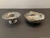 Front view of two bowls side by side on black surface