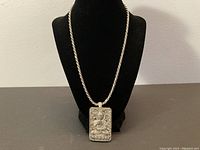 Full view of necklace displayed on bust