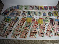Spread of multiple 1969-70 OPC hockey cards laid out on a surface