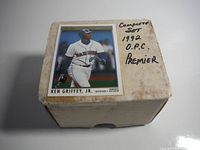 Photo of white cardboard box holding the complete 1992 OPC Premier Baseball card set with handwritten label reading 'Complete Set 1992 OPC Premier' and a picture of Ken Griffey Jr. on the box.