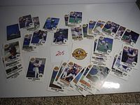 Wide view of 1990 Blue Jays baseball cards laid out showing various players including John Olerud rookie card.