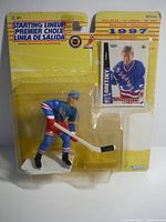 Front view of unopened 1997 Starting Lineup NHL Wayne Gretzky figurine and collectible card in blister pack.