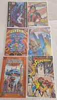 Photo showing 6 comic books including Harlan Ellison's Shockwave Rider, Liberty and Justice, 2 Mech Thing issues, Lady Death, and The Legacy of Superman.