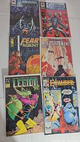 Collection of six comic books including Shadowman, Fear Agent, Next Testament, Legion '92, Excalibur