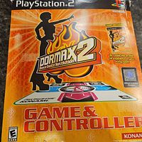 Original box showing DDRMAX 2 branding and game & controller labeling