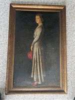 Front view of the framed portrait showing a woman in a long silver dress holding a red hat, with visible cracking on the painting's surface and a gold-toned frame with some chips.