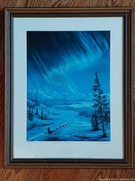 Straight-on view of the framed Quest Aurora limited print with signature and numbering visible.