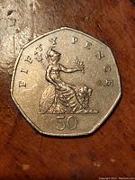 Top view of the coin's reverse side showing the Britannia design and denomination