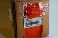 Close-up image of the product label on the cardboard box showing brand, product type, and dimensions.