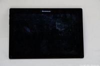 Front view of Lenovo Tab 2 A10-70 tablet showing black screen and Lenovo logo on the top bezel.