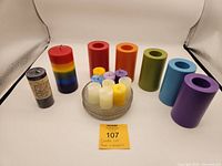 Full lot arrangement showing all wax and battery operated candles along with candle plates.