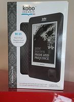 Front of the Kobo eReader retail box showing model with Jane Austen's Pride and Prejudice on screen, mentions Wi-Fi and 100 titles.