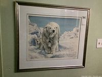 Full view of framed print showing the polar bear with two cubs in an Arctic scene.