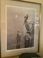 Full-framed view of print showing overall condition, mat, frame and glass