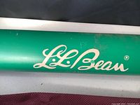 Close-up of green L.L.Bean tube with brand logo