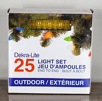 Front view of the Dekra-Lite 25 light set box showing outdoor use and number of bulbs