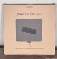 Box packaging showing text 'Digital HDTV Antenna' and 'FREE access to TV broadcast channels in full 1080p HD!'.