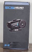 Photo of the front of the product box showing the SCS S-9 Bluetooth Helmet Intercom model and image of the device.