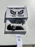 Photo of Owl Tools Torx Wrench Set box with two organized sets of wrenches inside, one silver, one black.