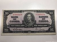 Front of 1937 Canadian $10 bank note showing King George VI portrait, serial number, and denominations in English and French.