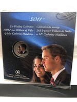 Front view of the 2011 Royal Canadian Mint Wedding Celebration coin package featuring Prince William and Catherine Middleton photos with sealed coin.
