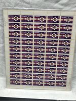 Full pane of 50 Canadian Order of Canada Medal stamps, 12 cent value each, sealed in original packaging.