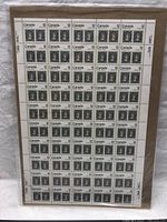 Full view of the unopened full sheet containing 50 stamps featuring Queen Victoria.