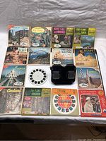 Top-down photo showing multiple slide packet covers with view finder in center