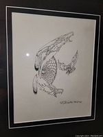 Close-up detailed view of the sketch, showing line work and signature.