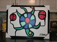 Front view of entire painting in black frame