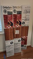 Three boxed CedarSafe Natural Cedar Closet Liners stacked vertically against a wall, unopened condition.