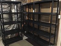 Three assembled shelving units side by side, with one angled forward for full view.