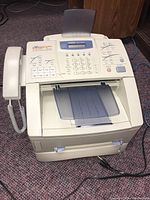 Full view of Brother MFC-8500 showing handset, control panel, numeric keypad, paper feed area, and function buttons