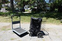 Photo showing the folding dolly and grocery buggy side by side on pavement with grass background