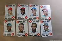 Eight 1968 Topps baseball game cards laid flat in two rows.