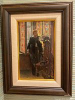 Framed vertical oil painting showing full composition of gentleman with tall English oak chair and stained glass behind.