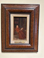 Full view of framed oil painting on wood board showing burlap mat and wooden frame with beaded trim
