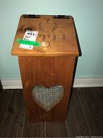 Front and side view of wood apple box with heart-shaped wire mesh cutout, showing overall box condition and design