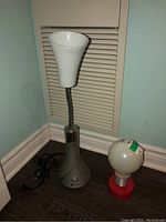 Full view of both lamps on floor, designed for close inspection of size and shape.