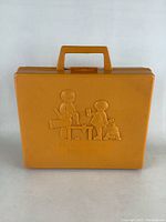 Carrying case front view showing orange plastic case with embossed image of children playing with tools