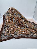 Scarf draped to show pattern and fabric texture