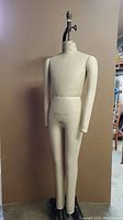 Front view of full mannequin showing body, arms, legs and base